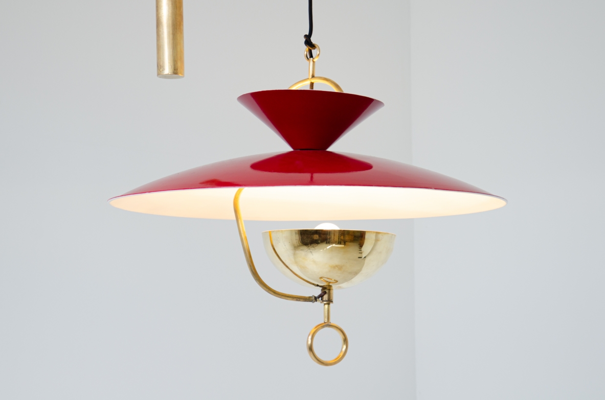 Rare 6-light adjustable chandelier in lacquered metal and brass with counterweight and pulleys.  Italian manufacture, 1940's.