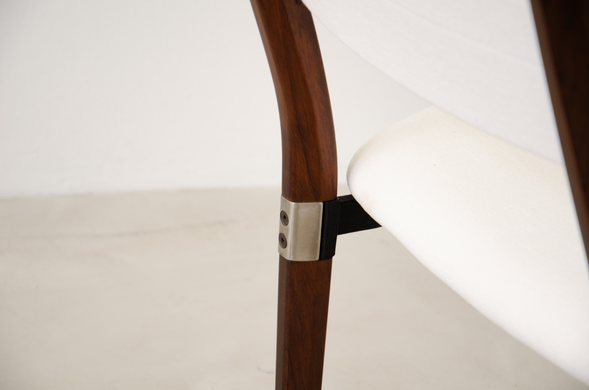 Eugenio Gerli (1923-2013)  Rare set of 8 chairs with structure in rosewood, metal and steel details.  Tecno Manufacture 1960.