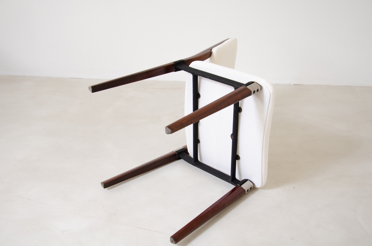 Eugenio Gerli (1923-2013)  Rare set of 8 chairs with structure in rosewood, metal and steel details.  Tecno Manufacture 1960.