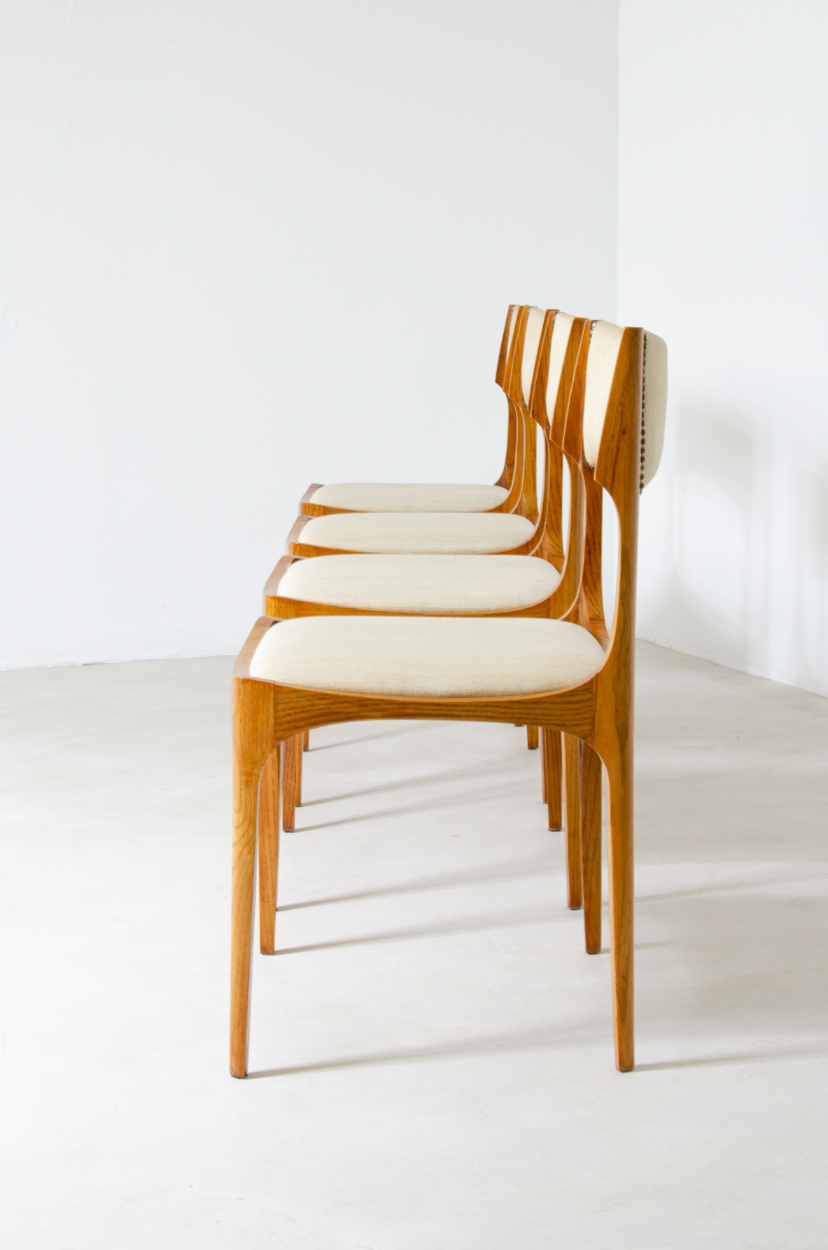 Giuseppe Gibelli  Set of 4 chairs in ash and upholstered fabric.  Sormani Manufacture, 1963.