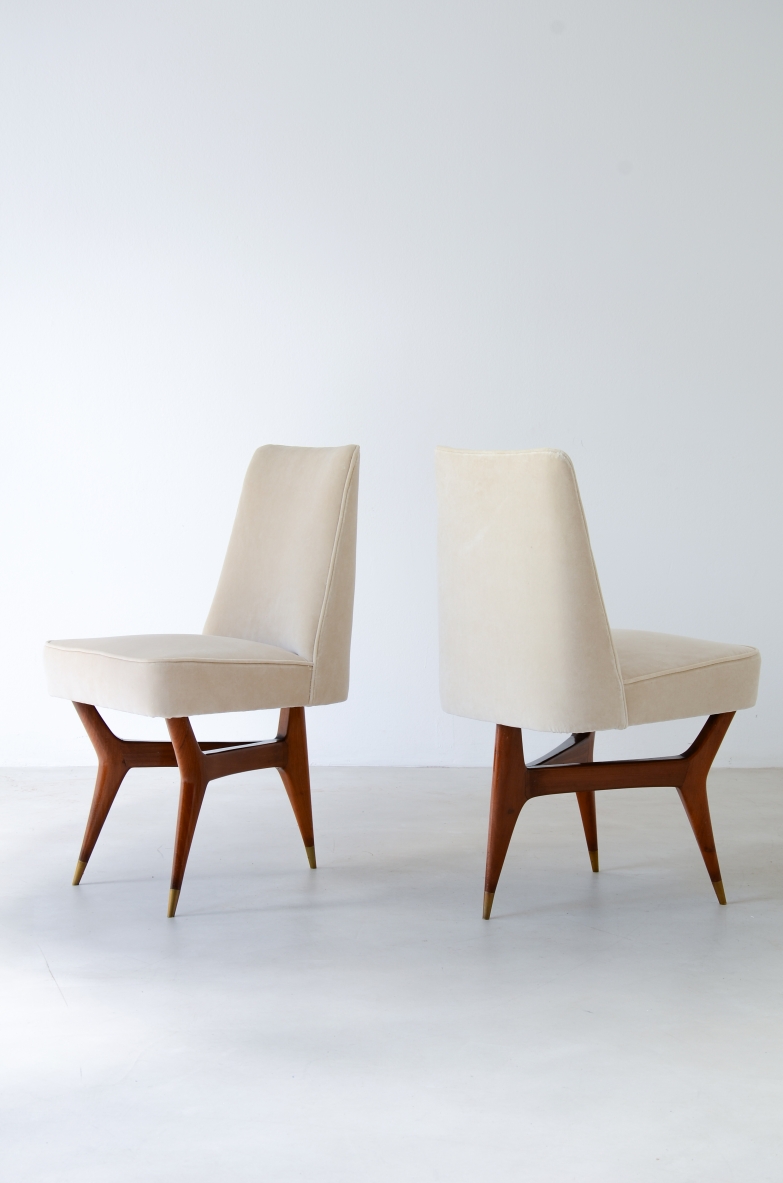 Melchiorre Bega (1898-1976)  Rare set of six wooden chairs with brass tips and fabric upholstery.  Italy, 1956