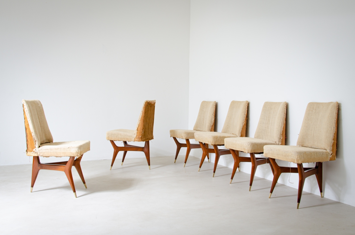 Melchiorre Bega (1898-1976)  Rare set of six wooden chairs with brass tips and fabric upholstery.  Italy, 1956