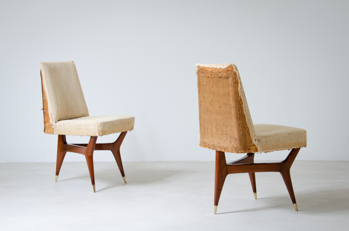 Melchiorre Bega (1898-1976)  Rare set of six wooden chairs with brass tips and fabric upholstery.  Italy, 1956