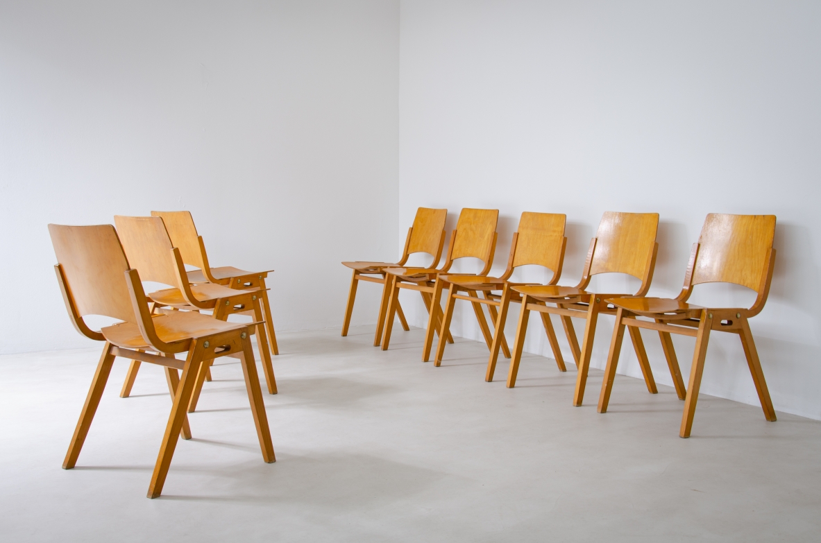 Roland Rainer (1910-2004)  Set of 8 mid century modern stacking chairs model P7 in curved plywood. Manufacture Emil & Alfred Pollak, Vienna, 1952.