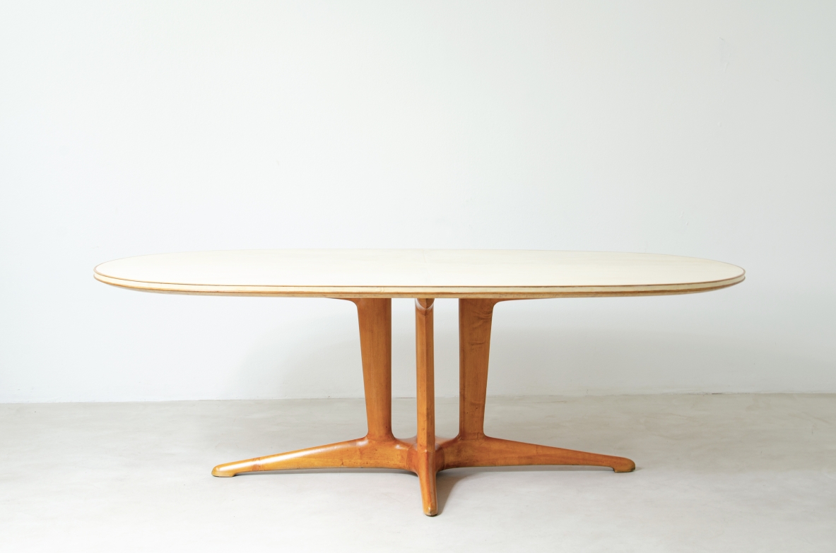Unique large table with elegant structure in maple wood and top covered with goat skin.  Italian 1950s manufacture.