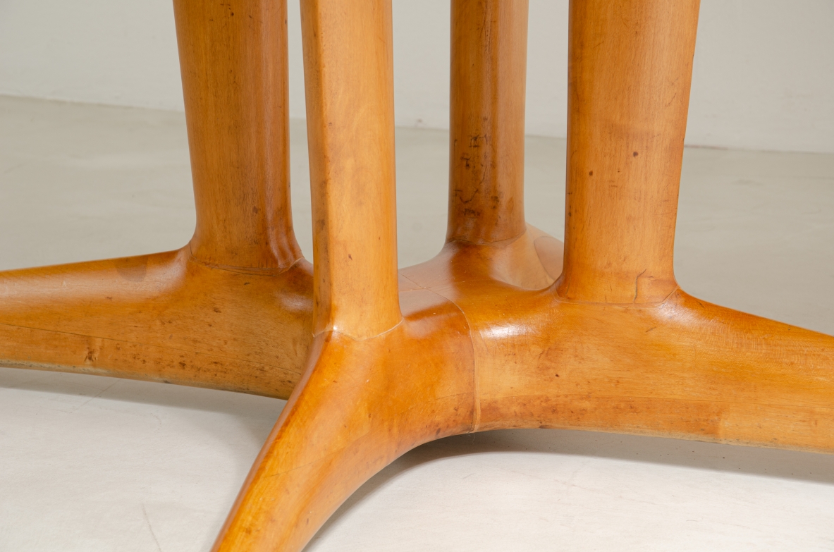 Unique large table with elegant structure in maple wood and top covered with goat skin.  Italian 1950s manufacture.