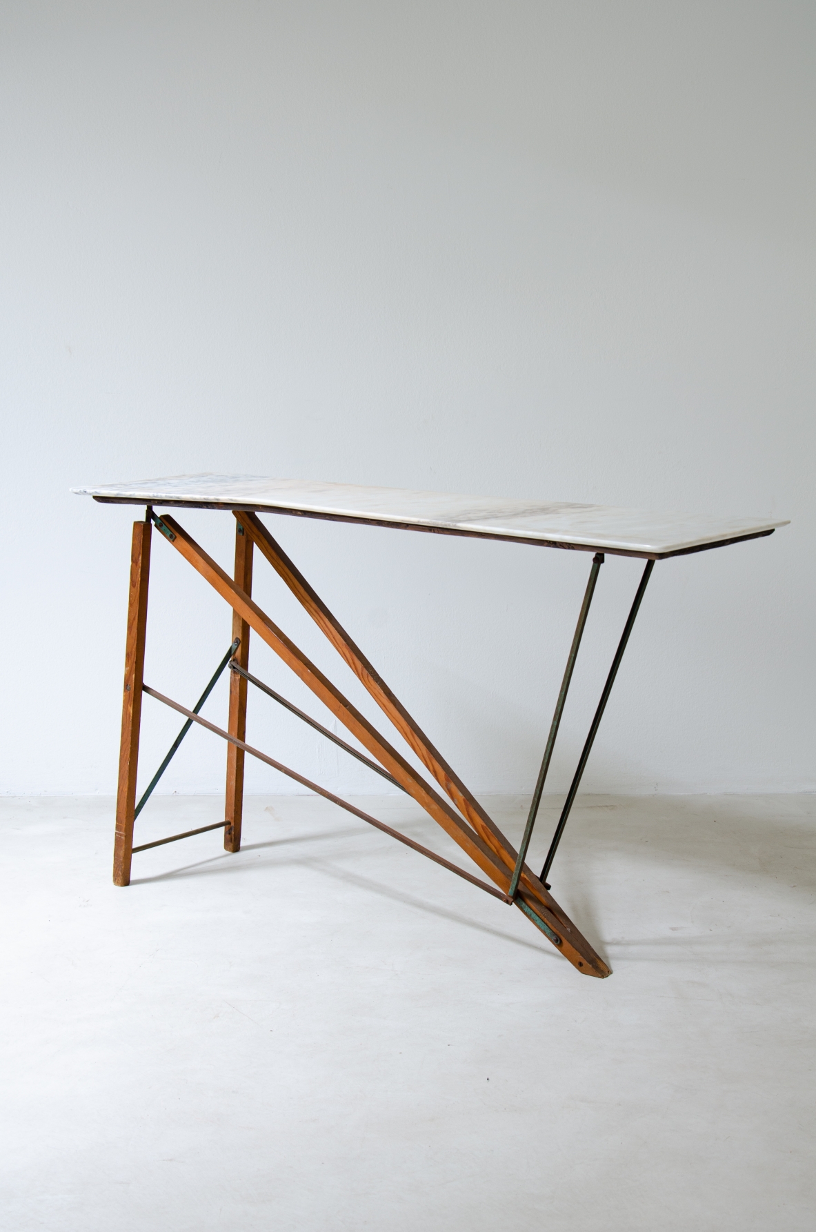 Console table with wooden structure, metal supports and irregular-shaped marble top. Italian manufacture, 1950's.