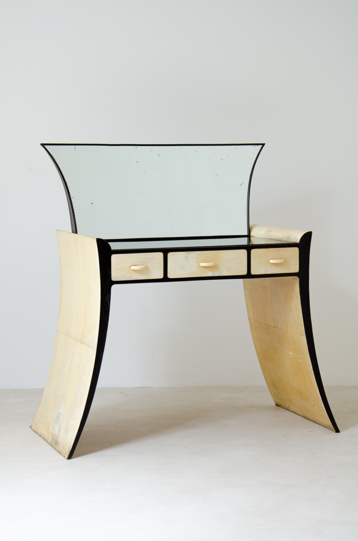 Guglielmo Ulrich. Unique console  table with mirror,  black lacquered wood and parchment covering. Italian manufacture, 1940s