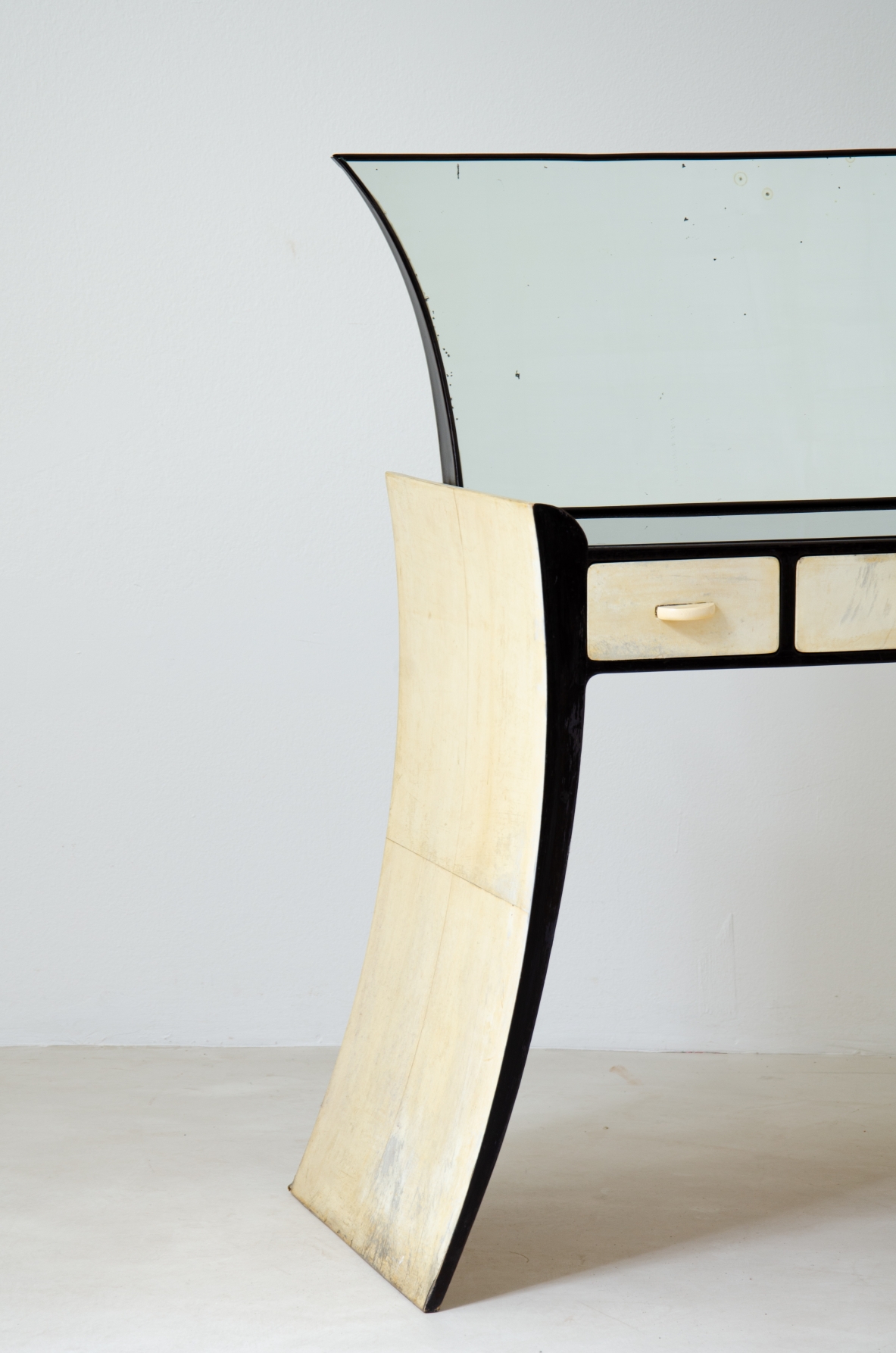 Guglielmo Ulrich. Unique console  table with mirror,  black lacquered wood and parchment covering. Italian manufacture, 1940s