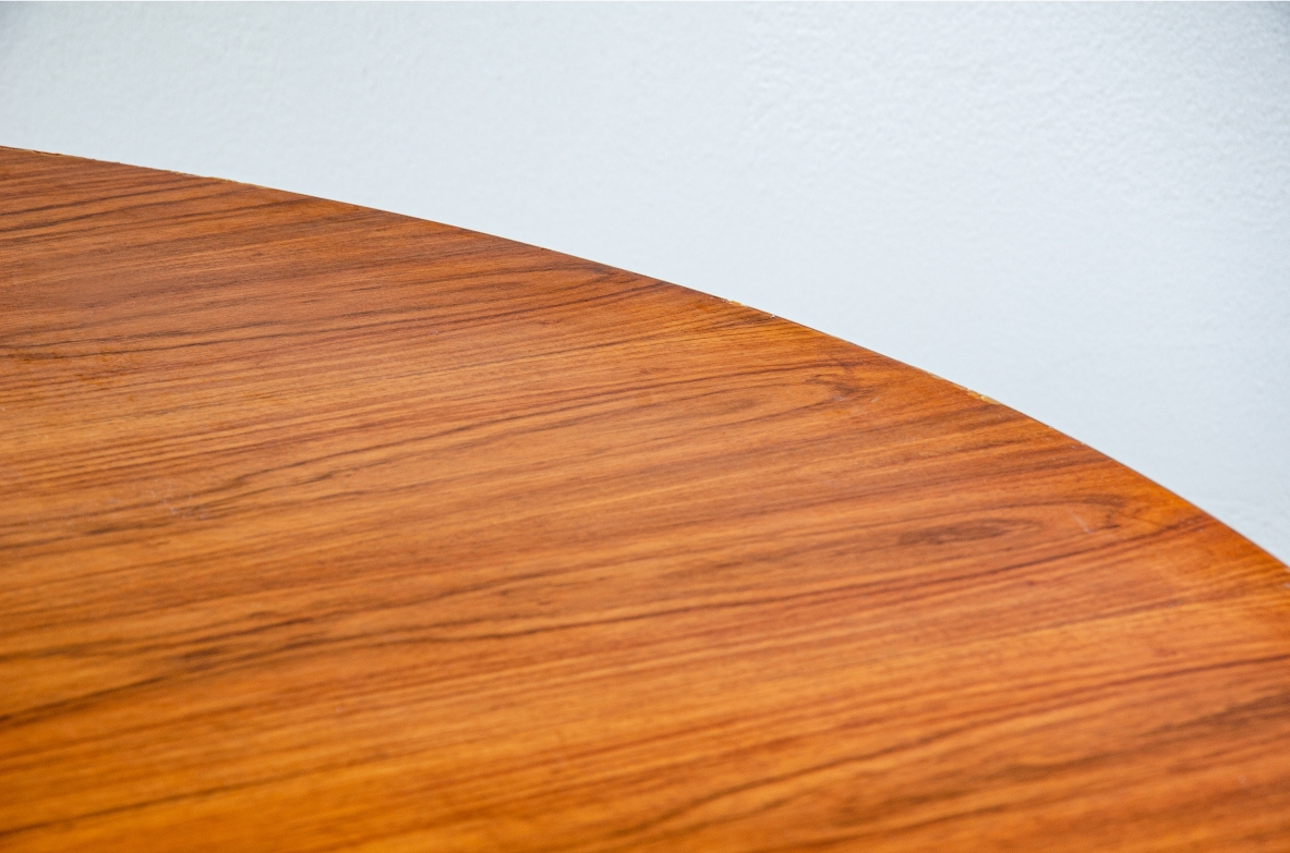 Unique large dining table with metal and brass base and veneered wooden top. Italian manufacture, 1950s.