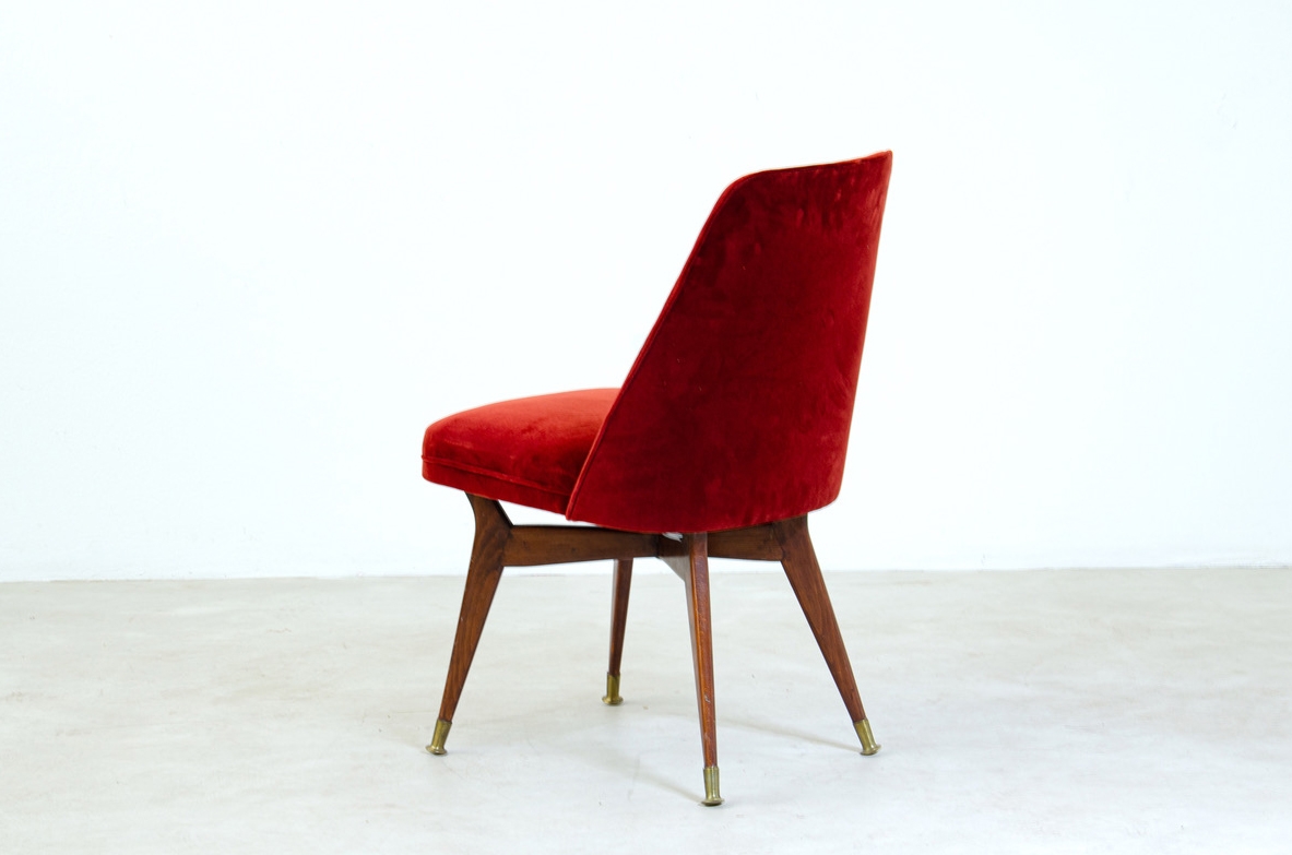 Melchiorre Bega, two chairs with padded seat, wooden structure and brass tips. Manufacture Bega & C., 1954.