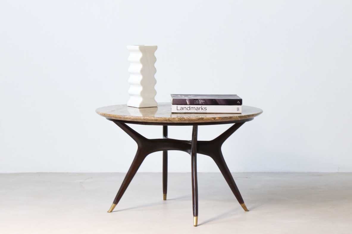 Italian 1950's elegant coffee table,with fine elegant bronze tips and marble top.