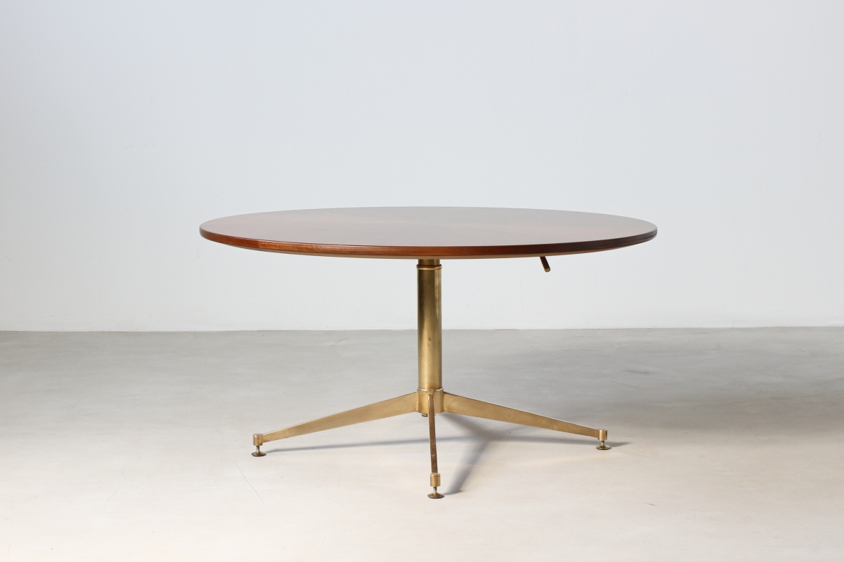 Unique table with up and down mechanism, brass base and walnut wood top. Italian manufacture, 1950's.