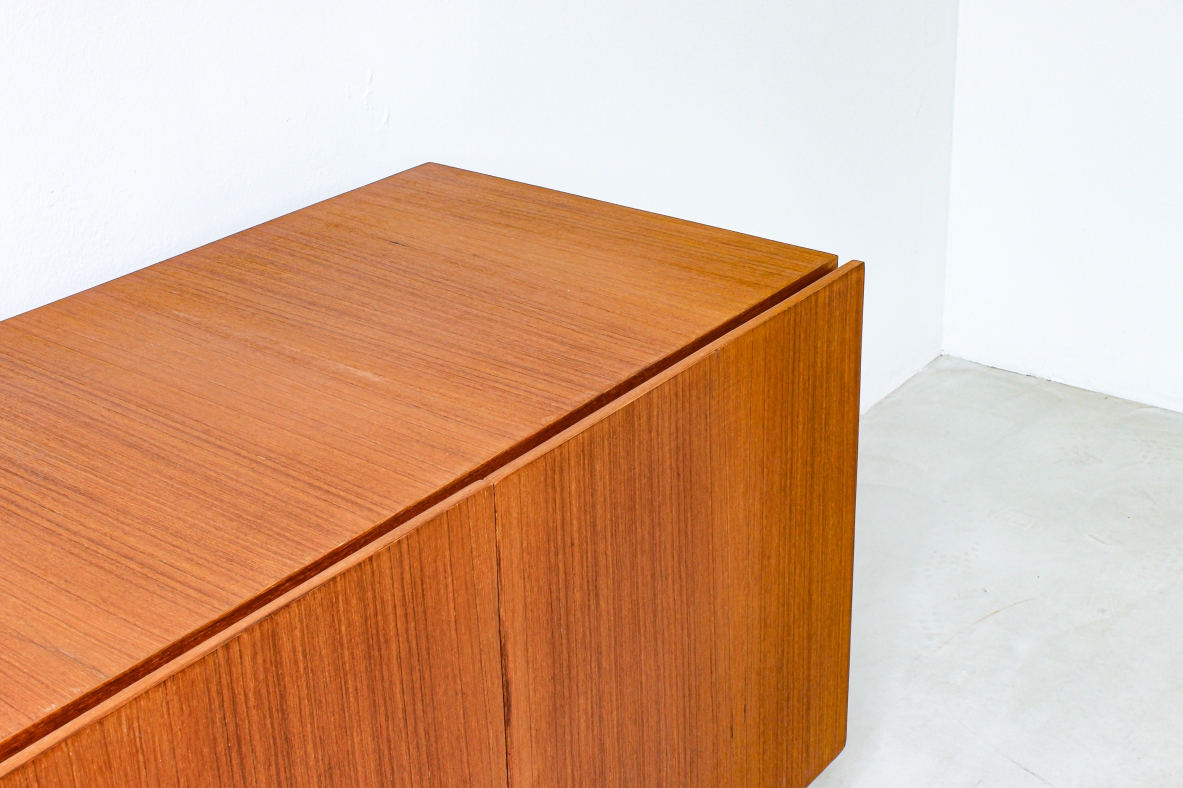 Container unit in blond wood with steel base. Italian manufacture, 1960's.