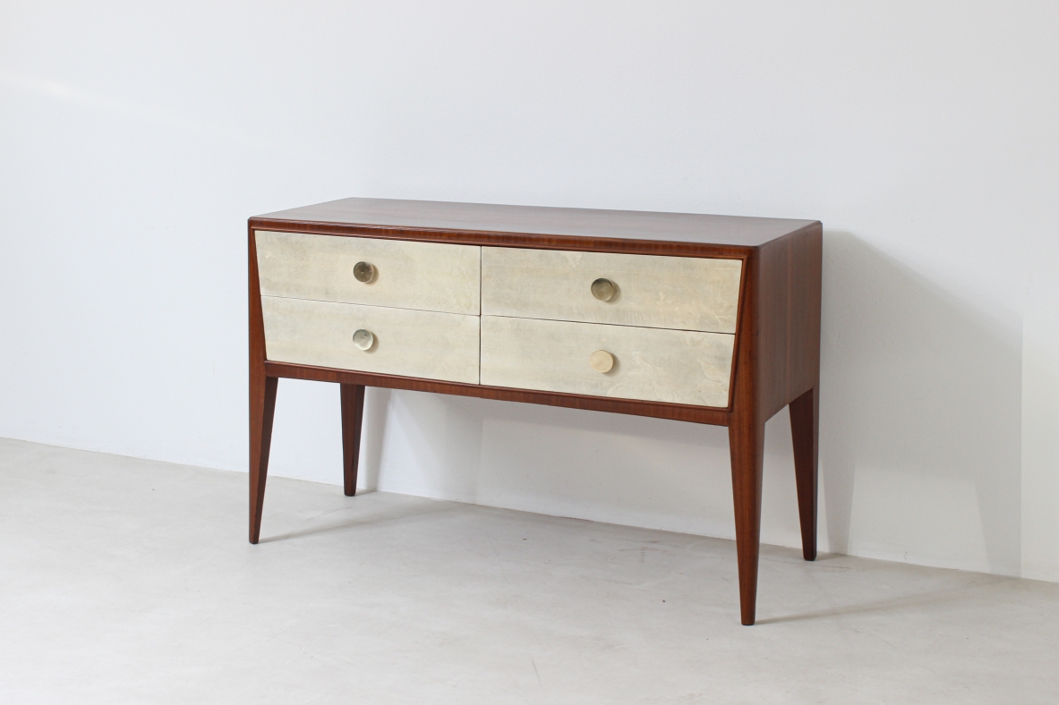 Chest of drawers in walnut with nice long and thin legs and brass handles.  Attributed to Paolo Buffa, 1950's.