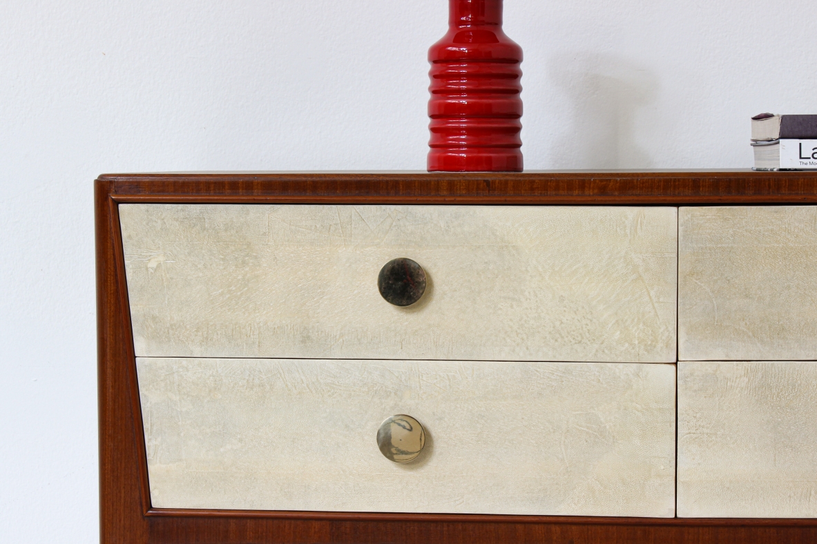 Chest of drawers in walnut with nice long and thin legs and brass handles.  Attributed to Paolo Buffa, 1950's.