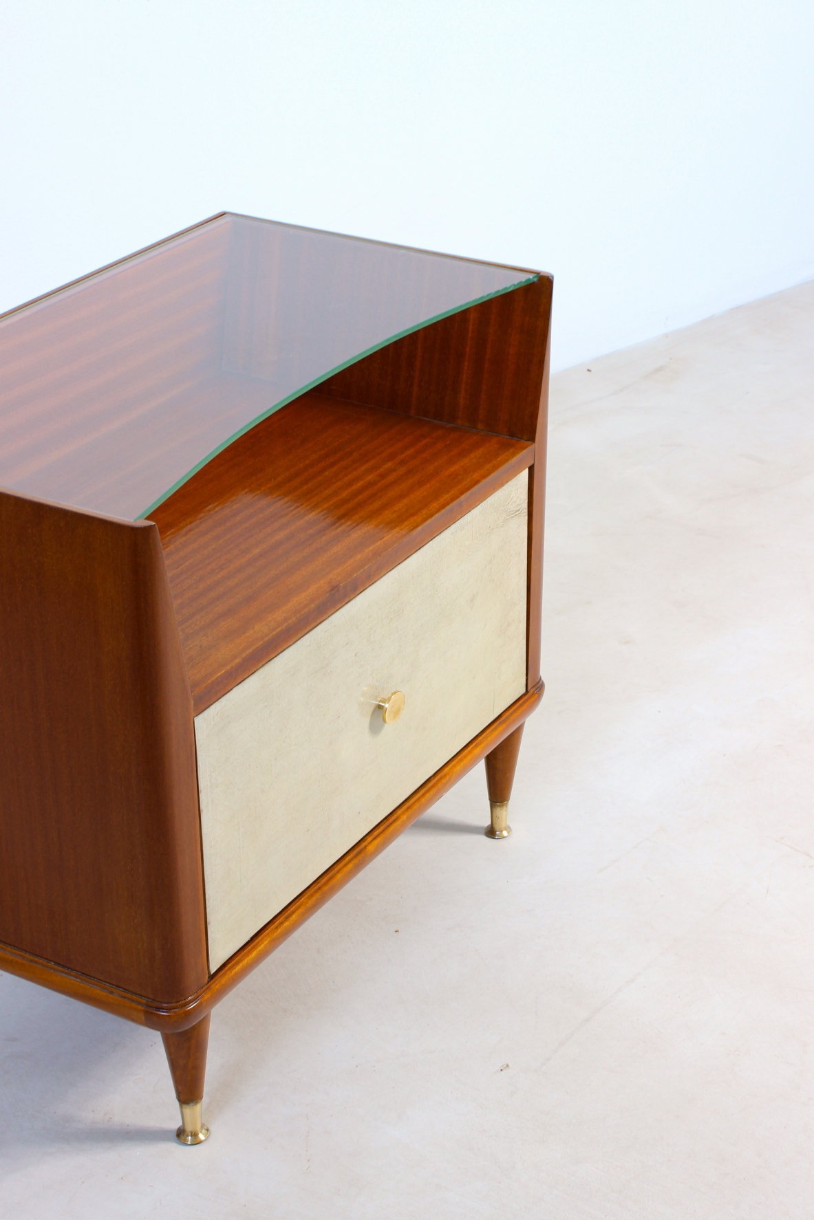Paolo Buffa (1903 - 1970)  Pair of bedside tables with parchment front, cut crystal top and brass tips, one drawer inside.  Italian manufacture, around 1950.