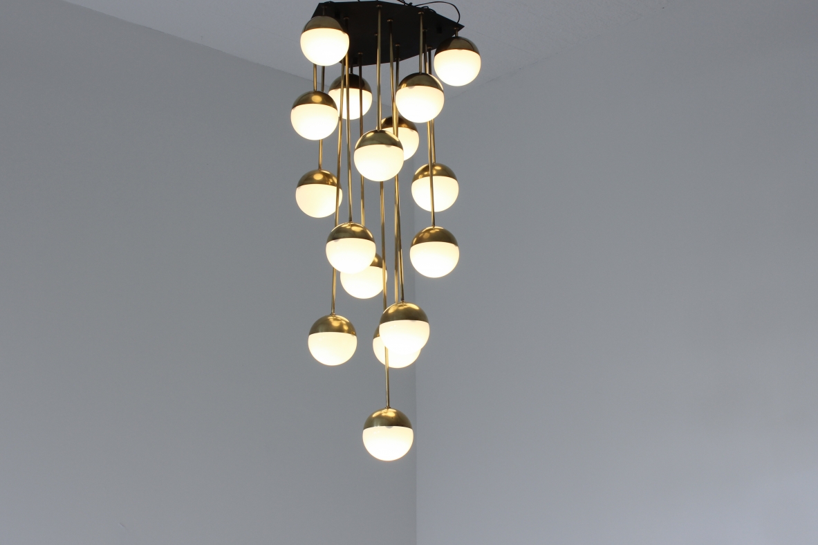 Large 18-light chandelier with brass structure and opaline glasses. Stilnovo production, 1960's.
