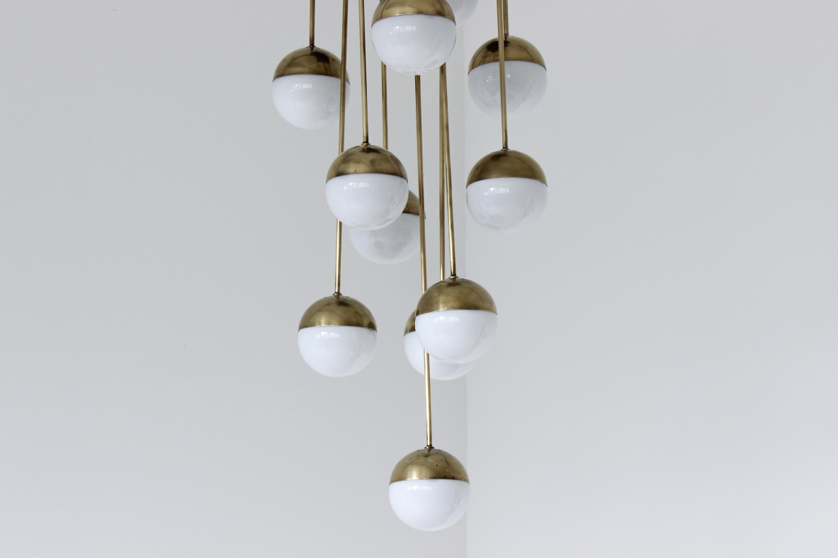 Large 18-light chandelier with brass structure and opaline glasses. Stilnovo production, 1960's.