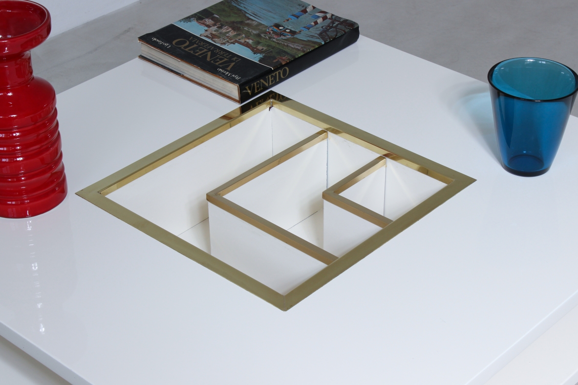 Mario Sabot. Low table in lacquered wood with central shaped bottle holder in brass. Sabot prod 1970's.