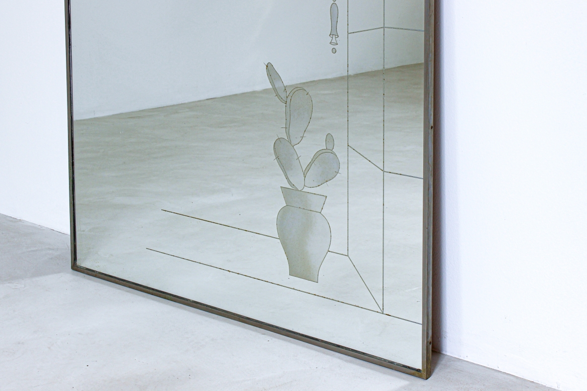Large arched mirror with architectural design. Italian manufacture around 1940.