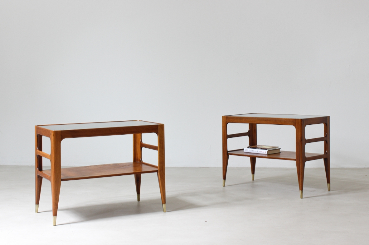 Unique pair of center tables in walnut with crystal glass top and sides openings, nice brass tips.  Attributed to Gio Ponti 1950's