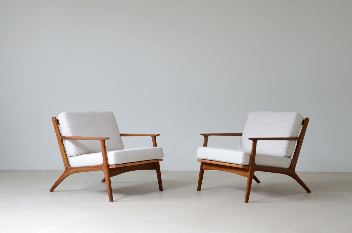 Pair of teak armchairs mod. 598 with upholstered fabric seat and back.  This armchair is part of a first production which was interrupted shortly afterwards and was therefore produced in very small numbers.  Scandinavian manufacture, early 60s.