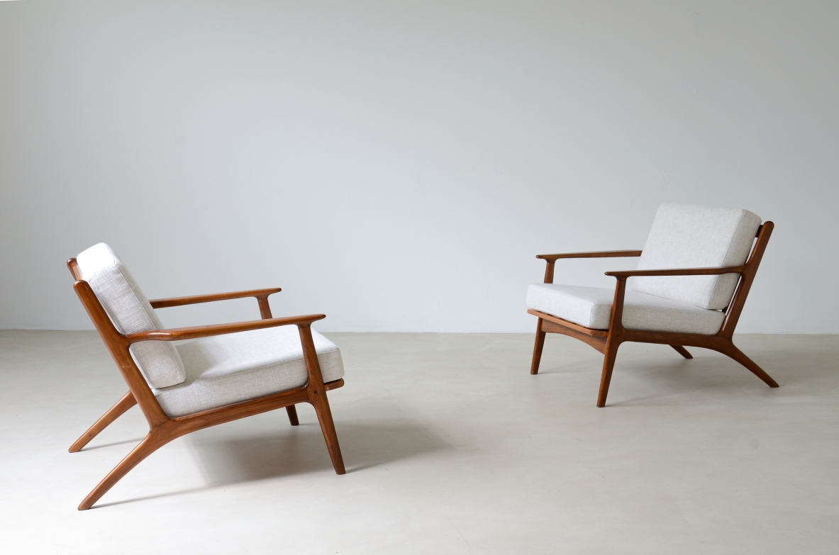 Pair of teak armchairs mod. 598 with upholstered fabric seat and back.  This armchair is part of a first production which was interrupted shortly afterwards and was therefore produced in very small numbers.  Scandinavian manufacture, early 60s.