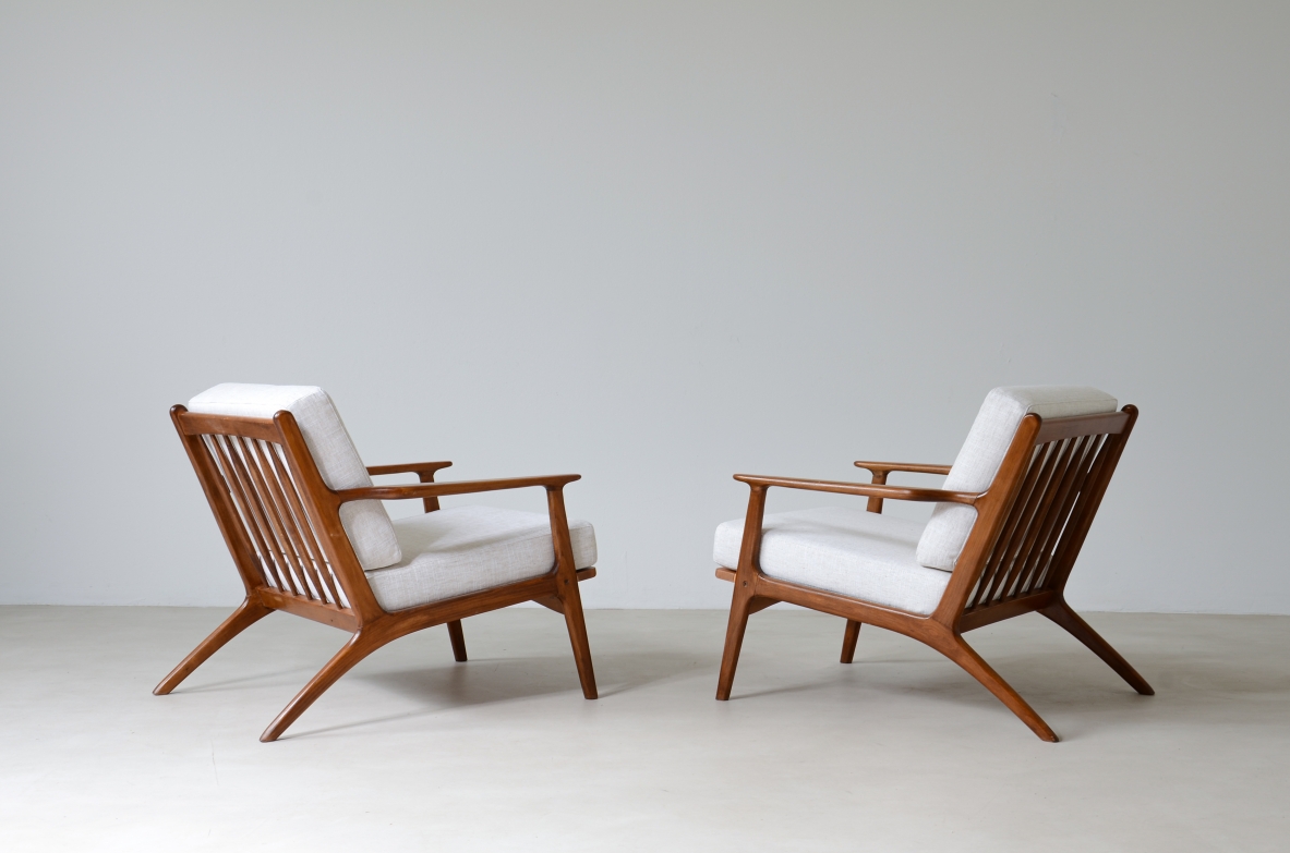 Pair of teak armchairs mod. 598 with upholstered fabric seat and back.  This armchair is part of a first production which was interrupted shortly afterwards and was therefore produced in very small numbers.  Scandinavian manufacture, early 60s.