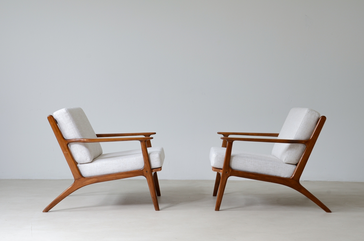 Pair of teak armchairs mod. 598 with upholstered fabric seat and back.  This armchair is part of a first production which was interrupted shortly afterwards and was therefore produced in very small numbers.  Scandinavian manufacture, early 60s.