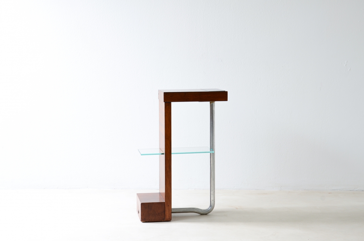 Armando Melis de Villa  Side table in polished wood with curved metal leg.  Designed for the Royal insurance company of Turin.  Italian manufacture, 1930's.