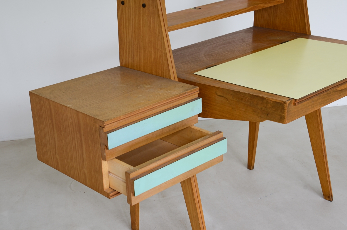 Ico Parisi (1916-1996)  Bedroom writing desk in oak with compartment for objects and shelf. Two drawers on the right side. Top and drawers with original period polypropyleneapplications.