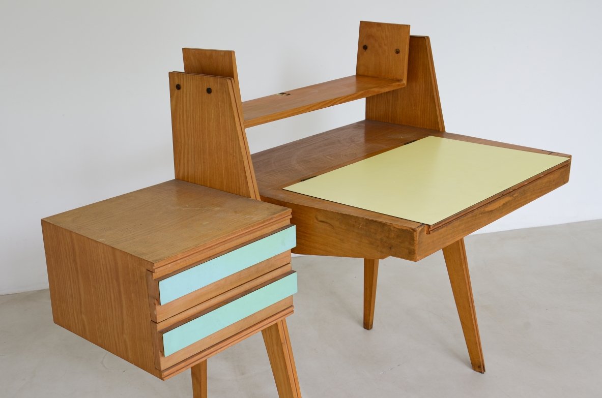 Ico Parisi (1916-1996)  Bedroom writing desk in oak with compartment for objects and shelf. Two drawers on the right side. Top and drawers with original period polypropyleneapplications.