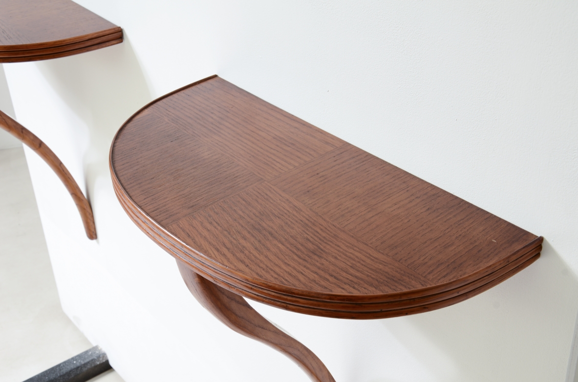 Pair of small consoles in oak with half-moon top and wall support arm.  talian manufacture, around 1940