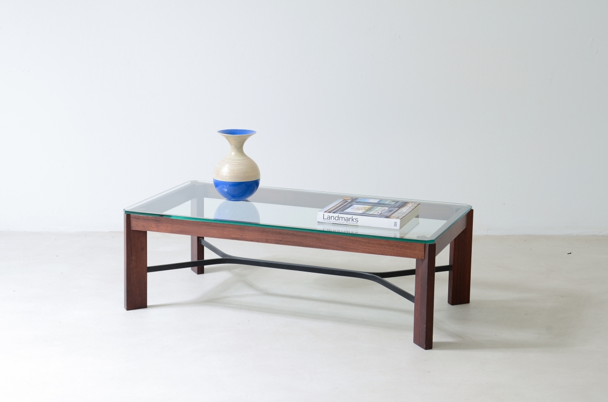 Coffee table with metal cross and thick glass top.  Made in Italy around 1960.