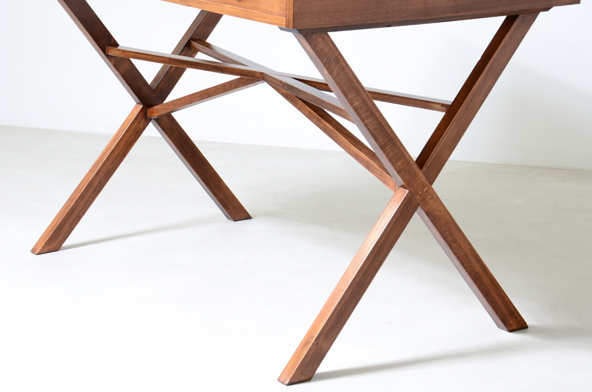 Center desk in walnut with beautiful cross on the base and little houses on the top.  Italian manufacture, 1960's