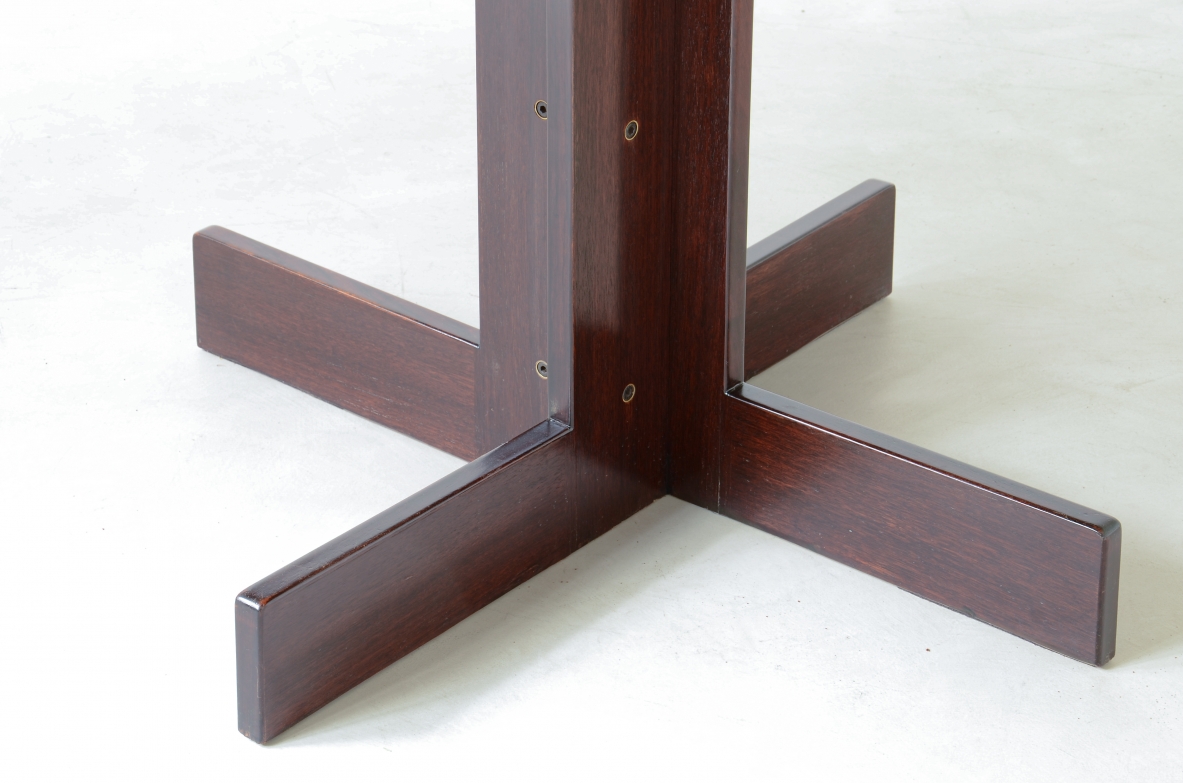Rosewood table with helix base, brass details.  Italian manufacture, 1970's.