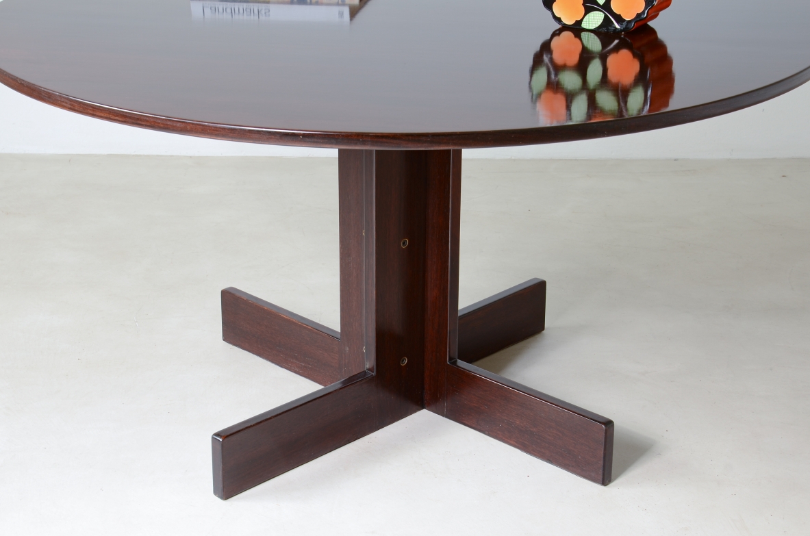 Rosewood table with helix base, brass details.  Italian manufacture, 1970's.