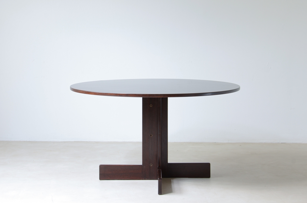 Rosewood table with helix base, brass details.  Italian manufacture, 1970's.