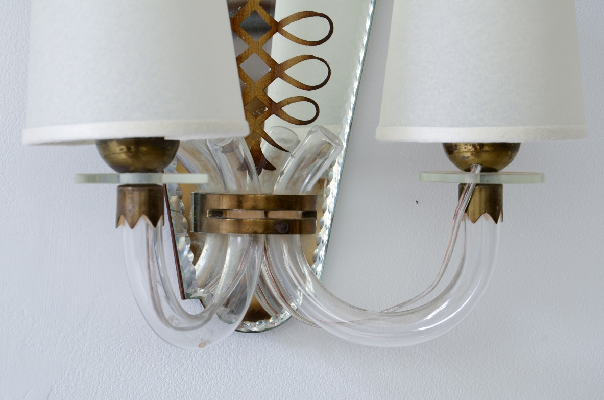 Emilio Lancia  Pair of wall lamps with elegant blown glass arms, shaped fan in engraved and mirrored crystal with brass profile.  1930's manufacture.