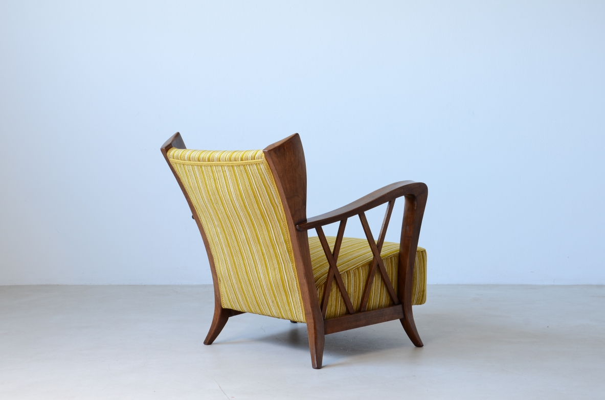 Maurizio Tempestini (1908-1960)  Elegante poltrona in rovere con disegno mosso  1940 ca.