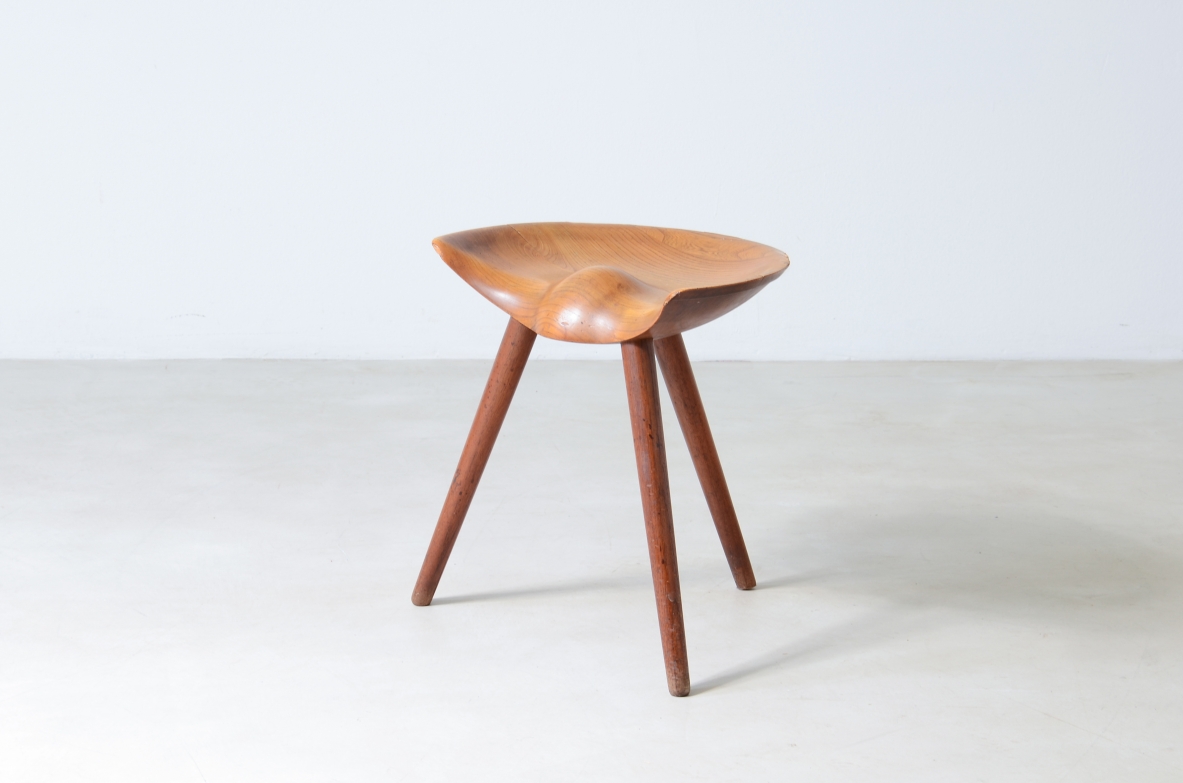 Extraordinary sculpted wooden stool in cherry Italian 1940s manufacture.