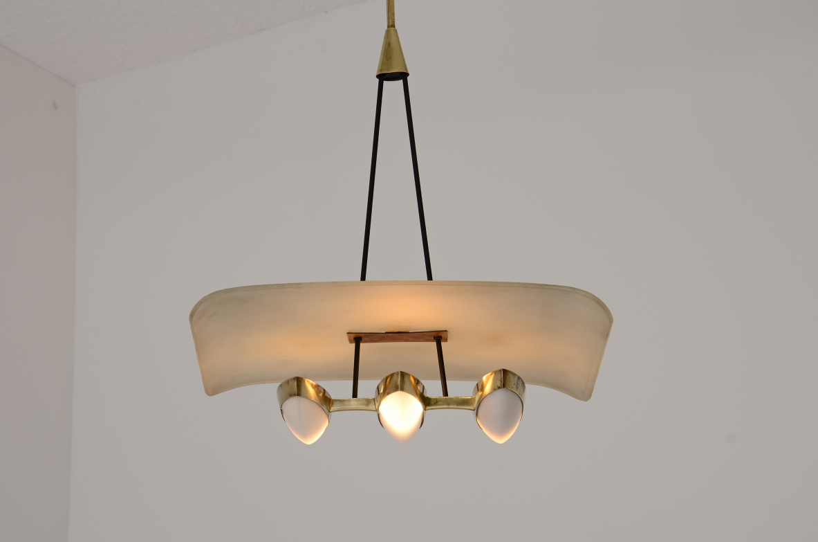 Gilardi Barzaghi metal and brass chandelier with curved metal shade. Manufacture 1950.
