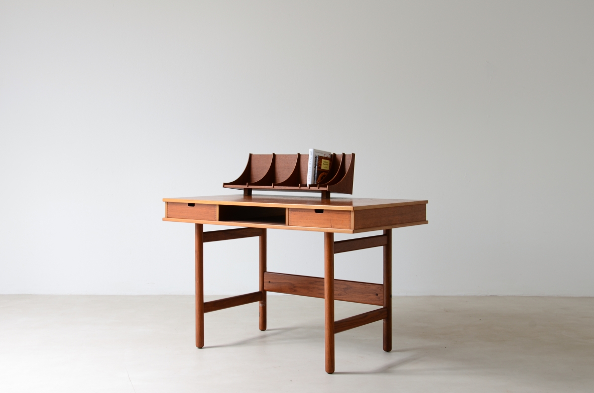 Small central desk with two drawers on the front, open compartment and beautiful document holder on the top.  Italian manufacture, ca. 1960.