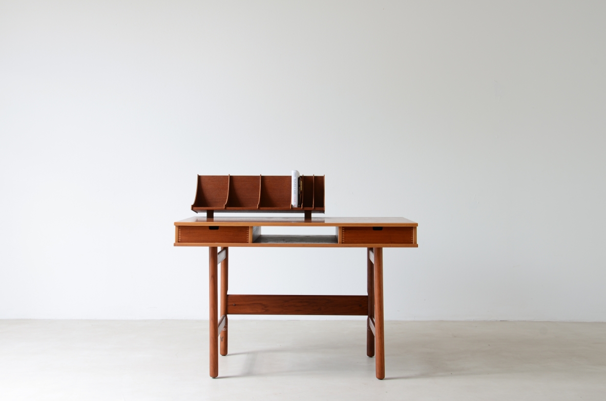 Small central desk with two drawers on the front, and open compartment  Italian manufacture, ca. 1960.