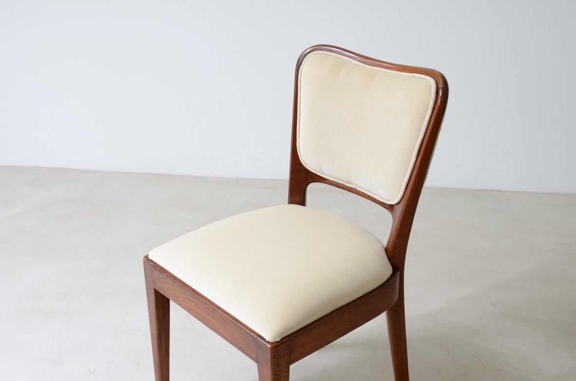 Osvaldo Borsani 8 mahogany chairs with padded seat and back. ABV 1955.
