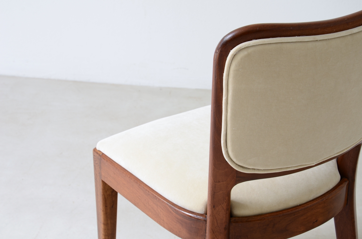 Osvaldo Borsani 8 mahogany chairs with padded seat and back. ABV 1955.