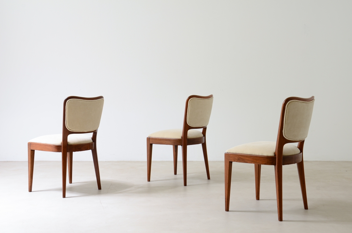 Osvaldo Borsani 8 mahogany chairs with padded seat and back. ABV 1955.