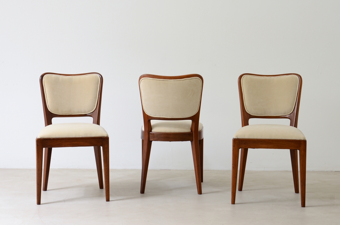 Osvaldo Borsani 8 mahogany chairs with padded seat and back. ABV 1955.