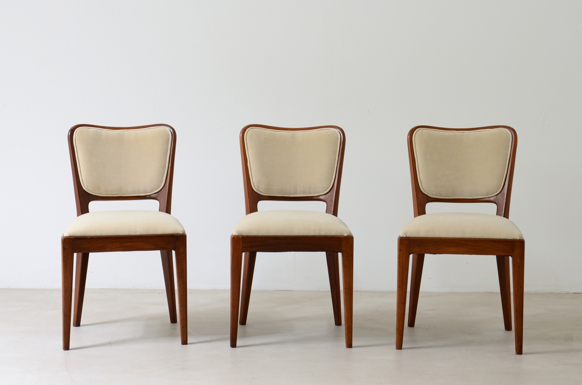 Osvaldo Borsani 8 mahogany chairs with padded seat and back. ABV 1955.